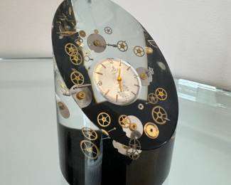 Vintage lucite “Clock Parts” paperweight, attributed to Pierre Giraudon