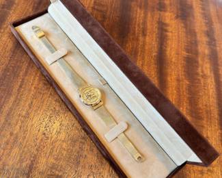 Vintage ladies Hamilton 10kt rolled gold watch with Merrill Lynch Bull motif, Never Used