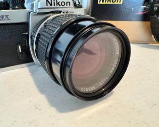 Vintage Nikon FM2 35mm camera with Vivitar Auto 2600 flash