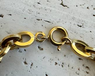 Marked 750 (18kt) gold charm bracelet with 7 - 750 marked charms