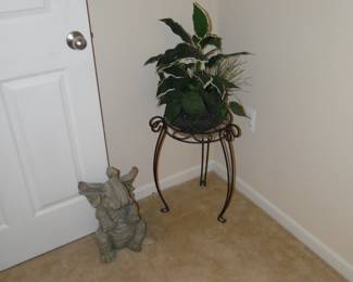 Nice sitting elephant, along with a faux plant and metal plant stand too
