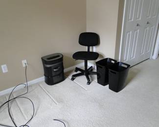 Office chair, shredder, and wastepaper baskets