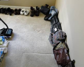 Because we can line the walls with purses, handbags and shoes