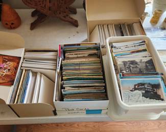 Vintage post cards, many in plastic sleeves 