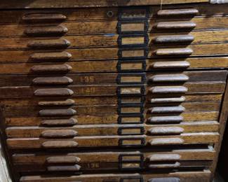 SIX ANTIQUE OAK FLAT FILE CABINETS ALL HAVE ORIGINAL HANDLES AND LABEL PLATES.