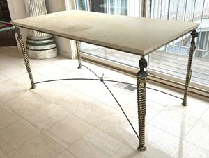 Nefertiti Table by Mario Villa 

Custom made table by Mario Villa consists of brass wrapped legs accompanied by a steel crossbar and steel frame. 

The middle center is accented with a brass knot and dragonfly figurine. 

Measures 60" x 30" x 29". This one of a kind designed table is signed by the artist. It is in vintage condition with some wear to the surface 