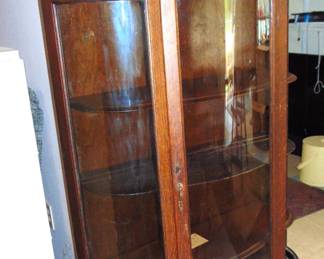 ANTIQUE OAK CURIO CABINET - CARVED DUAL BEVELED MIRRORS , CURVED GLASS, GROOVED PLATE SHELVES, MISSING ONE PANE OF GLASS