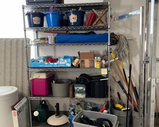 Assorted outdoor items, coolers, clothing racks
