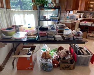 Kitchen towels, baskets, metal and glass baking pans, decor