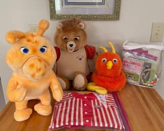 Teddy Ruxpin, Fob, and Grubby with books and tapes