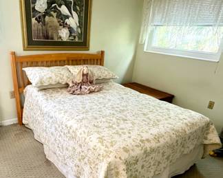 Full-size bed with headboard