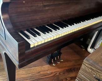 Baby grand piano - we have numbersfor piano movers