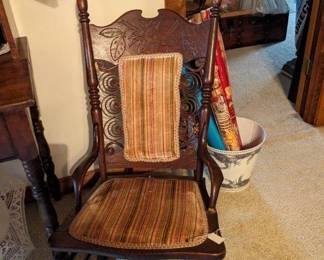Antique Carved Rocking Chair with Fabric Back and Seat