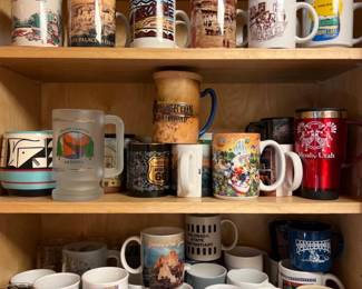 Cupboard Full of Coffee Mugs or Carriers