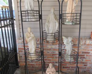 Iron plant stand with concrete statues