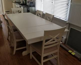 Dining room table seats 6; can be made smaller