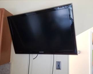 Flat screen TV with bracket