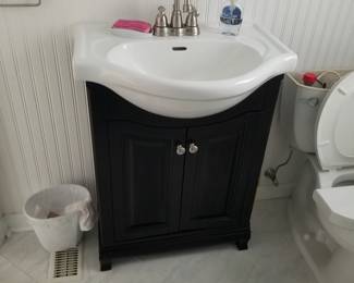 Small bath vanity -winterized - water is off - easy removal 