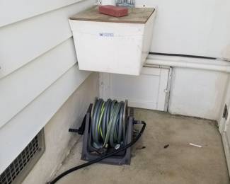 Laundry sink; hose & hose reel