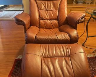 Two Leather chair and ottoman