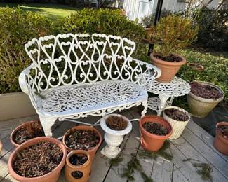 Victorian Style Cast Aluminum Outdoor Love Seat w/ Heart Back (3 Available), Round Side Table (2 Available).   Lots of Pots & Planters-Many with small shrubs