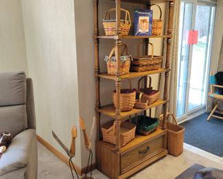 Shelf full of Longaberger Baskets