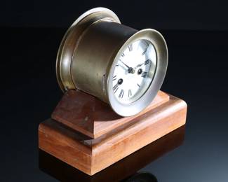 Antique Waterbury Brass Ship Clock on Base Nautical Marine	Clock Bezel: 5.5in<BR>Total: 7.75x9x4.5in	199016
