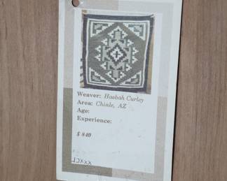 Two Grey Hills Navajo Rug Hasbah Curley Mounted on Board	Rug: 33x20.5in<BR>Frame:41.5x27.5x1in	199146
