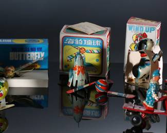 Lot of 6 Vintage Wind-Up Tin Litho Toys in Box - Blic Jumping Rabbit - Seal Playing Ball - Jumping Dog - Butterfly - Clown Riding Scooter	6 x 5 x 3 in largest box	198035
