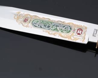 Hoffritz NY Vintage Etched Knife Made in Germany Seit Solingen 1906 with Sheath Made in Germany	Knife: 13.5in<BR>Blade; 8.2in<BR>In Sheath:	199035
