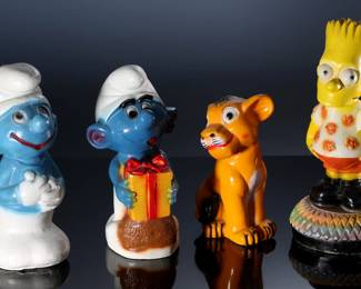 Lot of 4 Vintage Carnival Chalkware Cartoon Character Figure Statues - Smurfs - Bart Simpson - Simba Lion King	Smurf 1 - 10x4x5 Bart 12x6x6 Simba 8x5x5 Smurf 2 9.5x4x6	198034
