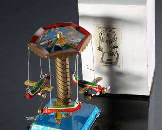 Lot of 7 Vintage Wind-Up Tin Litho Toys in Box - Schylling Graf Zeppelin - Flying Lion Racing Car - Clockwork Motorcycle with Sidecar - Airplanes - Russian Train Station	3 x 10 x 5 in largest box	198032
