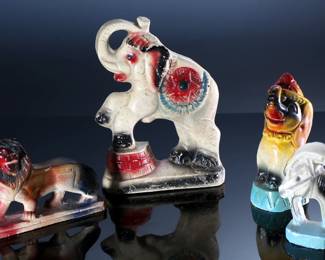 Lot of 4 Vintage Carnival Chalkware Figure Statues - Circus Elephants - Horshoe - Lion	Elephant on bucket 10x7x2 in - Horseshoe 6x4x2 in - Lion 5.5x7x2 in - Elephant with hat 8x3x3.5 in	198046

