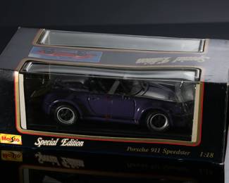 Maisto Special Edition 1989 Porsche 911 Speedster Die Cast Model Car 1:18 #46629	5x6x12.5in	196182
