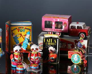 Lot of 6 Vintage Tin Litho Wind-Up Toys in Box - Circus Animal Truck - Panda Drummers - Western Cart with Cowboy - Schylling Rocket Ride Carousel - Clown Riding Scooter	10 x 3.5 x 4 in largest box	198030
