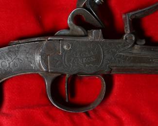 Matched Pair Seglas London Flintlock Pistols in Display Case Flint Lock 	Pistol: 5.6x0.65x2.8in<BR>Display: 2.5x11.5x9in	199154
