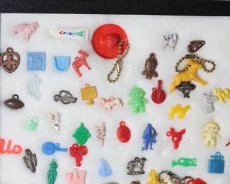 Large Lot of 1950s Vintage Bubblegum Prize Cracker Jack Toys in Display 	12.25x16.25x0.75in	196228
