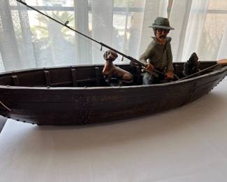 Fisherman with his little dog and a barrel  of fish!  