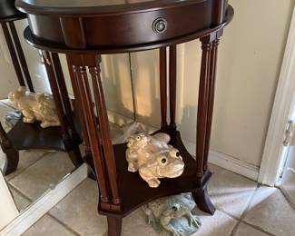 Side table with frogs.