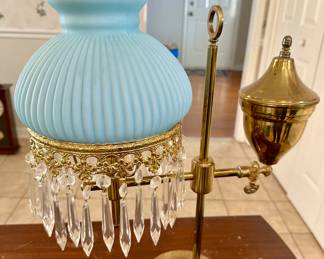 Antique brass student lamp with blue shade and prisms. 