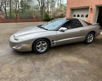2000 silver Pontiac Firebird with 210,700 miles , $12,500, recently painted