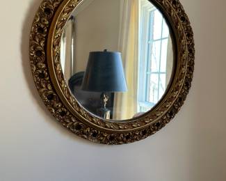 Antique round mirror with gold filigree mirror