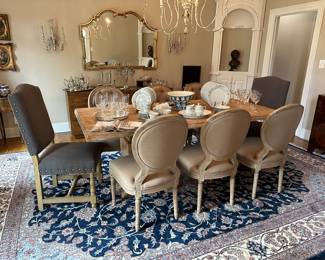 Restoration Hardware table and chairs, shown with additional upholstered end chairs