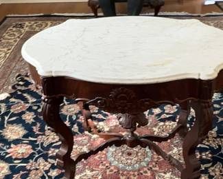 Circa 1860 rosewood marble top turtle shaped parlor table