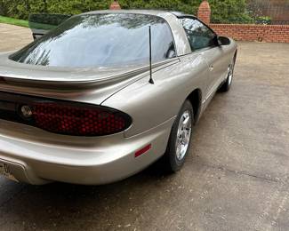 2000 silver Pontiac Firebird with 210,700 miles , $12,500, recently painted