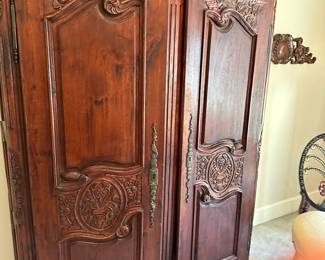 Mahogany reproduction carved wardrobe 
56” wide,  84 height