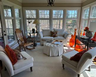 Sun room view with a touch of orange.  