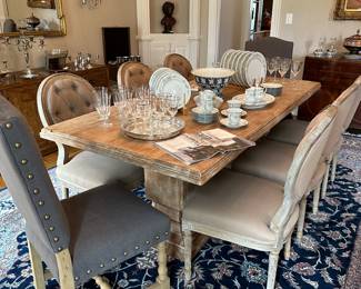 Restoration Hardware table and chairs, shown with additional upholstered end chairs