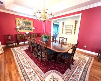 Sheraton Table with decorative banded edging; carved pedestal and carved base- 2 Arm Chairs 10 Side Chairs- Heirloom finish. 