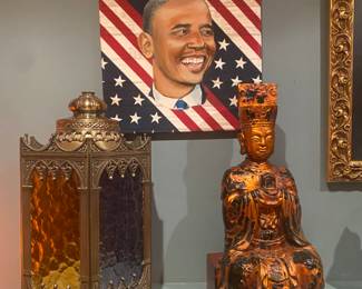 The brass lamp is part of the pair each $25. The young Barack Obama painting 12 x 12 is original artwork $100. The vintage Chinese Buddha is hand-carved and gilded $30.
